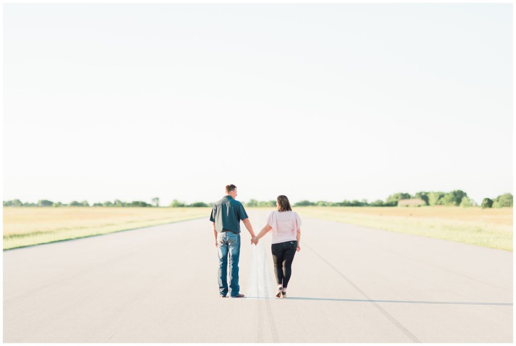 Engagement pictures | Commerce Municipal Airport in Commerce TX by Texas wedding photographer Karina Danielle