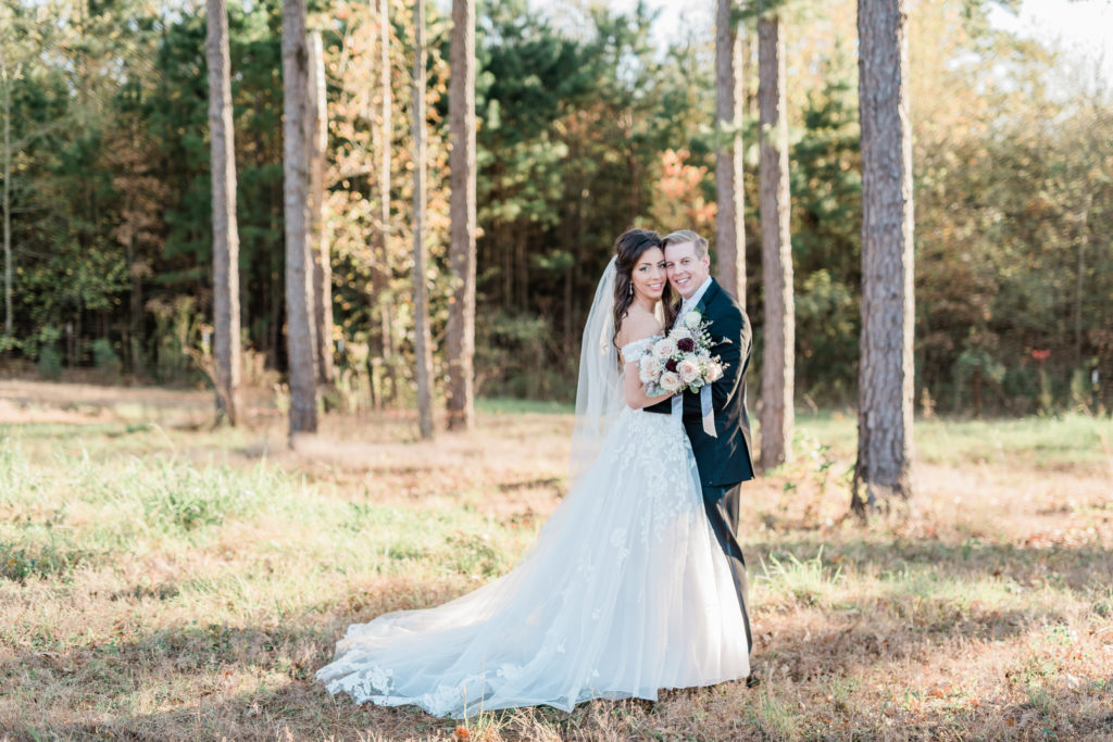 Blush Rose Gold Wedding Bride and Groom Portraits Fall Wedding Long Cathedral Veil | Sunset Oaks in Tyler TX by DFW Dallas Fort Worth wedding photographer Karina Danielle Photography