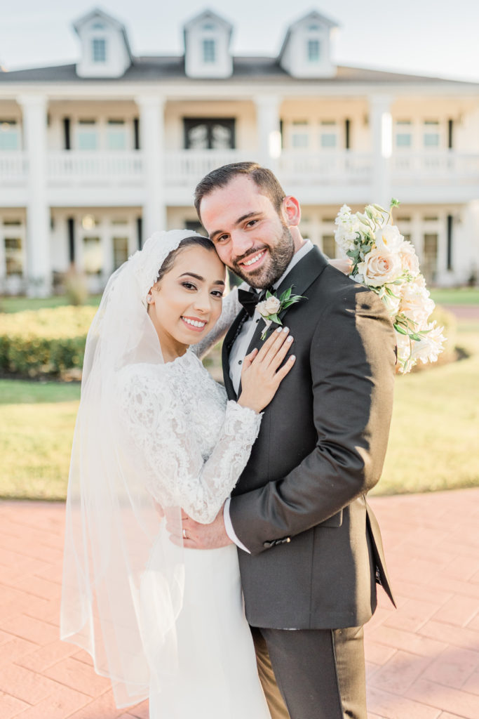 Bride and Groom Portraits Long Train Veil Blush Rose Bouquet | The Springs in Rockwall Texas by DFW Dallas Fort Worth wedding photographer Karina Danielle Photography