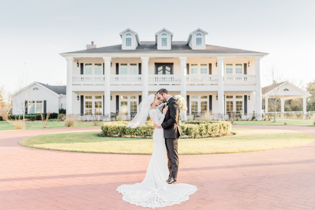 Bride and Groom Portraits Long Train Veil Blush Rose Bouquet | The Springs in Rockwall Texas by DFW Dallas Fort Worth wedding photographer Karina Danielle Photography