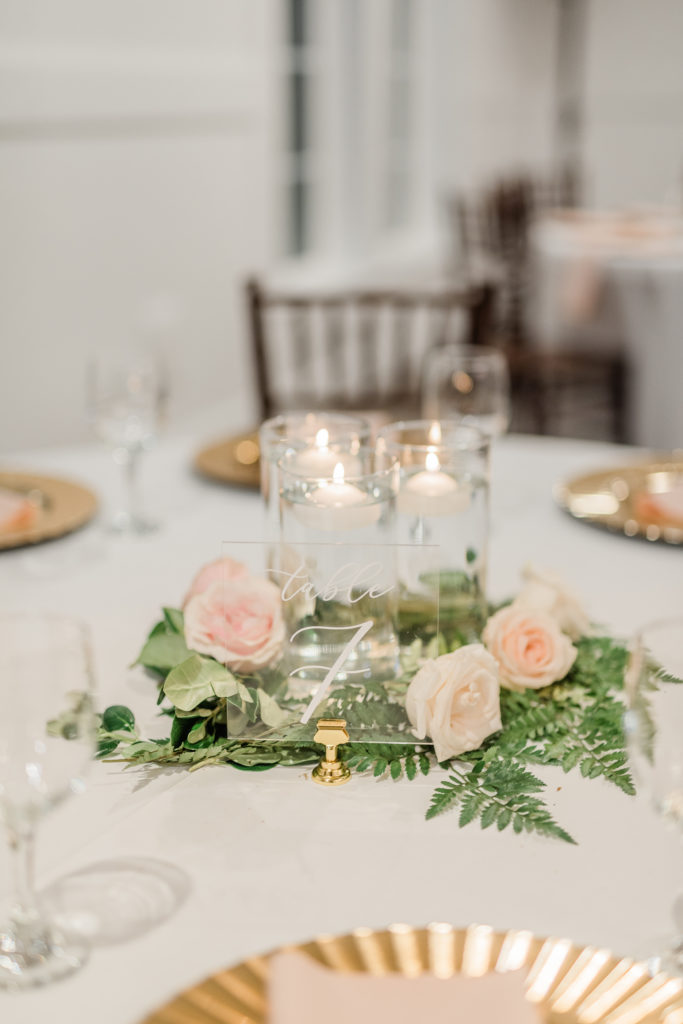 Reception Decoration Blush Rose Eucalyptus Candle Centerpiece Gold Chargers Acrylic Table Number| The Springs in Rockwall Texas by DFW Dallas Fort Worth wedding photographer Karina Danielle Photography