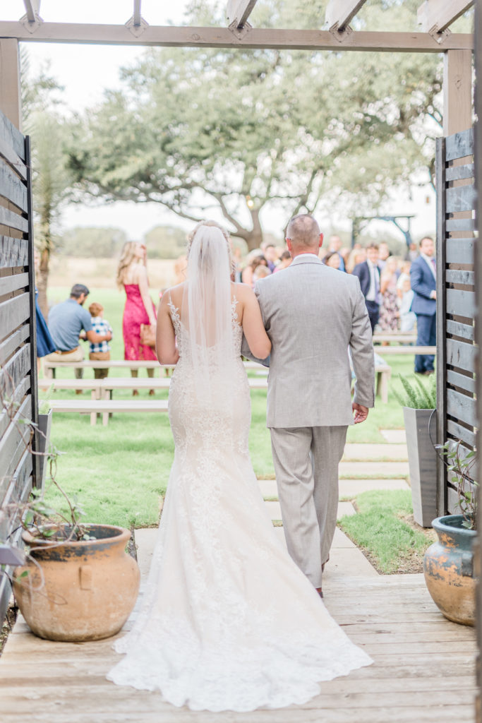 Bride and Dad Father Walks Down Aisle | Stonehouse Villa in Driftwood TX by DFW Dallas Fort Worth wedding photographer Karina Danielle Photography