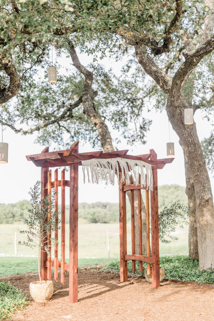 Ceremony Decor Macrame Wedding Arch | Stonehouse Villa in Driftwood TX by DFW Dallas Fort Worth wedding photographer Karina Danielle Photography