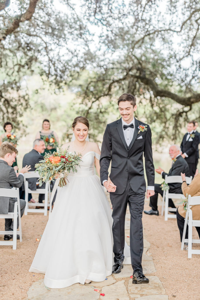 Bride and Groom Ceremony Recessional | Tapatio Springs Operator Drewski Wedding in Boerne TX by DFW Dallas Fort Worth wedding photographer Karina Danielle Photography