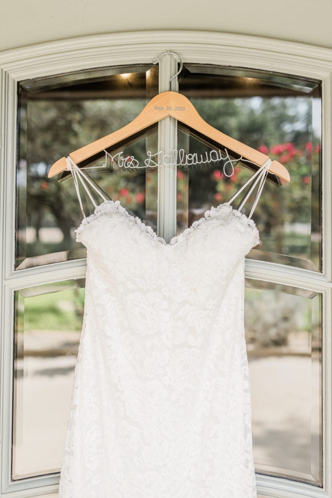 Wedding Dress Gown Hanging Hanger Venue Villa | Stonehouse Villa in Driftwood TX by DFW Dallas Fort Worth wedding photographer Karina Danielle Photography