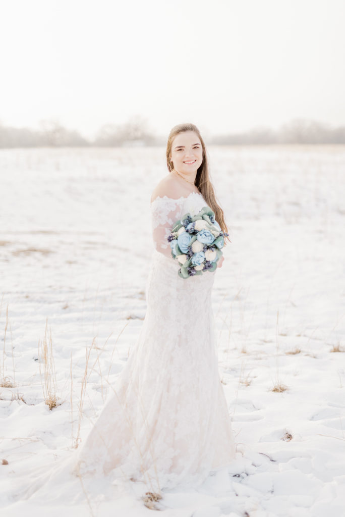 Snow Bridal Portraits Lace Sleeves Wedding Dress | 4B Ranch in Alba TX by DFW Dallas Fort Worth wedding photographer Karina Danielle Photography