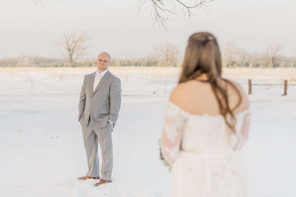 Snow Bride and Groom First Look Wedding Dress | 4B Ranch in Alba TX by DFW Dallas Fort Worth wedding photographer Karina Danielle Photography