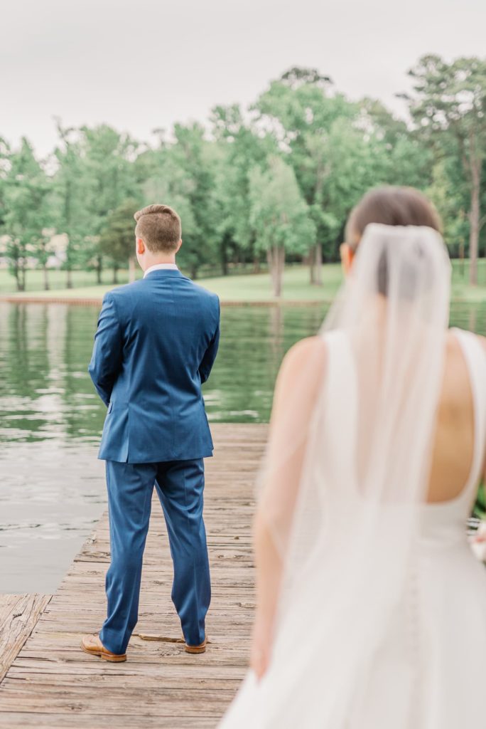 Bride and groom share a first look at Lake Tyler Petroleum Club, Tyler TX.
