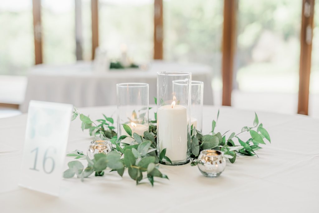 Table Candle and Greenery Details | Carleen Bright Arboretum in Waco TX by DFW Dallas wedding photographer Karina Danielle Photography