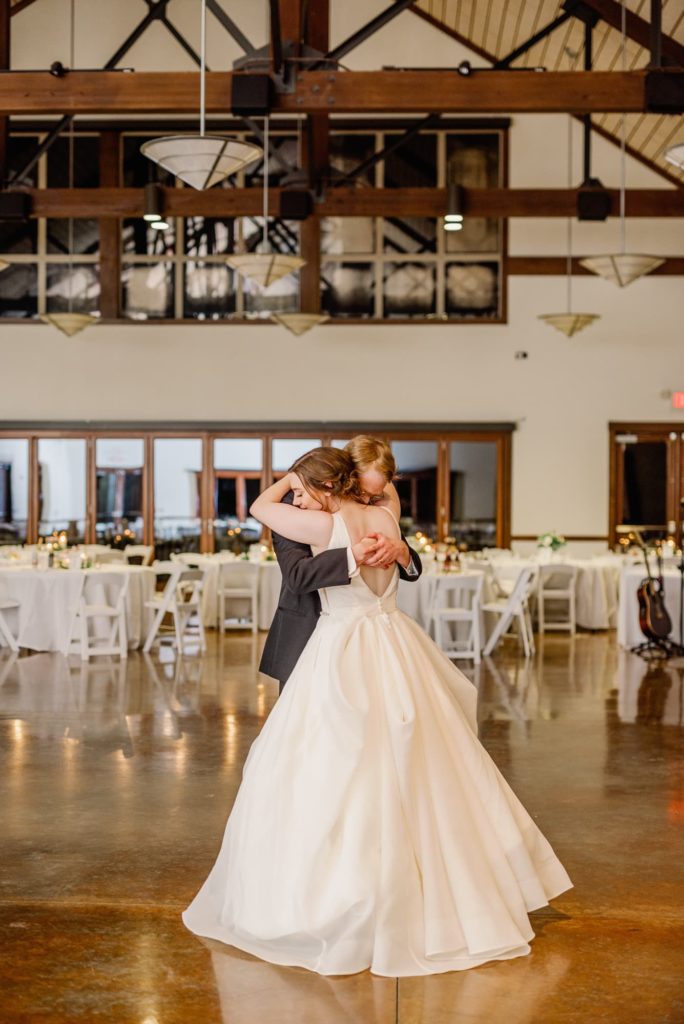 Couple Embrace During Last Dance | Carleen Bright Arboretum in Waco TX by DFW Dallas wedding photographer Karina Danielle Photography