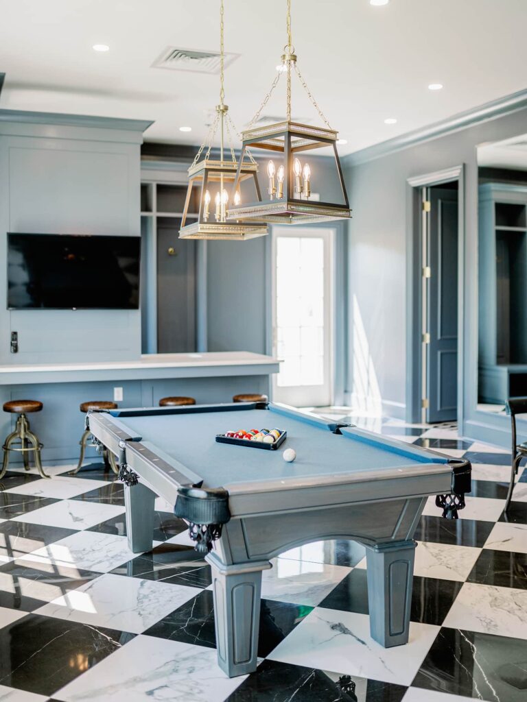 Pool table and flat screen TV in groom's suite at The Hillside Estate.